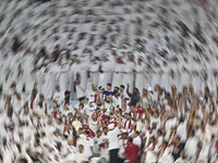 Qatar supporters cheer for their team during the FIFA World Cup 2026 AFC Asian Qualifiers 3rd round group A match between Qatar and Kyrgyzst...