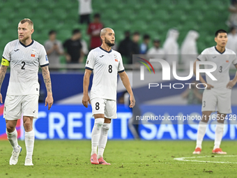 Players of Kyrgyzstan express their dejection after the FIFA World Cup 2026 AFC Asian Qualifiers 3rd round group A match between Qatar and K...