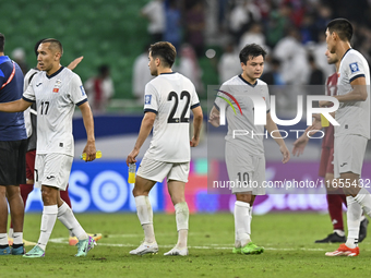 Players of Kyrgyzstan express their dejection after the FIFA World Cup 2026 AFC Asian Qualifiers 3rd round group A match between Qatar and K...