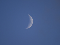 A rising Crescent Moon is seen from Kirtipur, Kathmandu, Nepal, on October 8, 2024. (