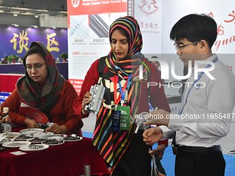 Foreign merchants buy fasteners at the 2024 International Procurement Conference in Handan, China, on October 10, 2024. (