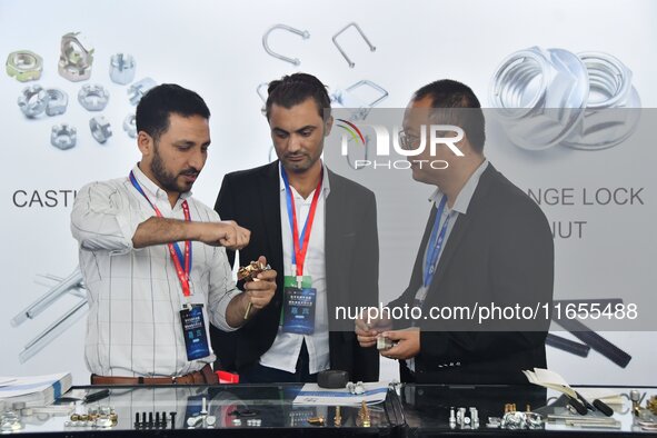 Foreign merchants buy fasteners at the 2024 International Procurement Conference in Handan, China, on October 10, 2024. 