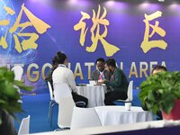 Foreign merchants negotiate business at the 2024 International Procurement Conference in Handan, China, on October 10, 2024. (