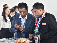 Foreign merchants learn about fastener products at the 2024 International Procurement Conference in Handan, China, on October 10, 2024. (