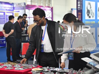 Foreign merchants buy fasteners at the 2024 International Procurement Conference in Handan, China, on October 10, 2024. (