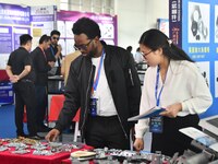 Foreign merchants buy fasteners at the 2024 International Procurement Conference in Handan, China, on October 10, 2024. (