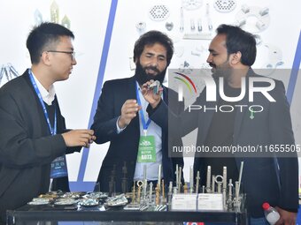 Foreign merchants buy fasteners at the 2024 International Procurement Conference in Handan, China, on October 10, 2024. (