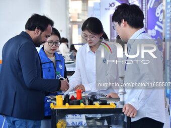 Foreign merchants learn about fastener products at the 2024 International Procurement Conference in Handan, China, on October 10, 2024. (