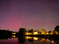 The northern lights (aurora borealis) appear in Toronto, Ontario, Canada, on October 10, 2024. (