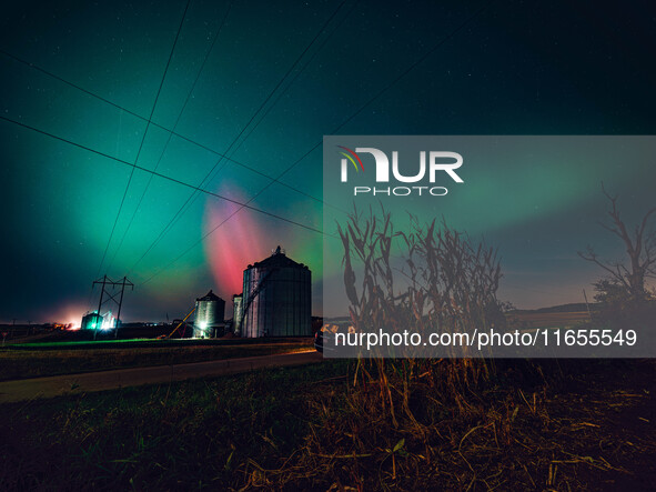 The night sky in Wisconsin glows with the Northern Lights as a geomagnetic storm brings vibrant pink and green colors to a majority of the n...