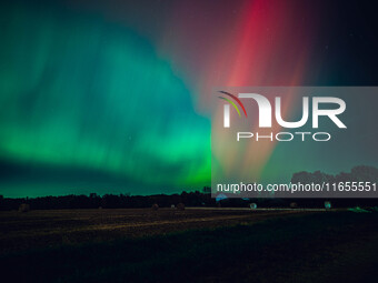 The night sky in Wisconsin glows with the Northern Lights as a geomagnetic storm brings vibrant pink and green colors to a majority of the n...