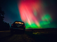 The night sky in Wisconsin glows with the Northern Lights as a geomagnetic storm brings vibrant pink and green colors to a majority of the n...