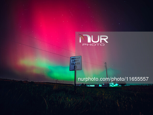 The night sky in Wisconsin glows with the Northern Lights as a geomagnetic storm brings vibrant pink and green colors to a majority of the n...