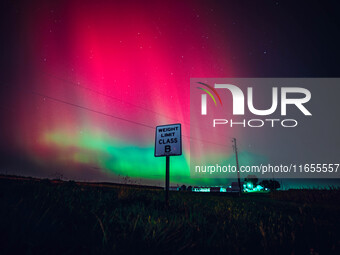 The night sky in Wisconsin glows with the Northern Lights as a geomagnetic storm brings vibrant pink and green colors to a majority of the n...