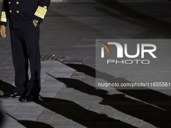 Shadows of cadets appear before the Commemorative Ceremony of the 200th Anniversary of the Mexican Republic in the Zocalo in Mexico City, Me...