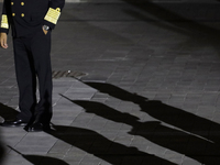 Shadows of cadets appear before the Commemorative Ceremony of the 200th Anniversary of the Mexican Republic in the Zocalo in Mexico City, Me...