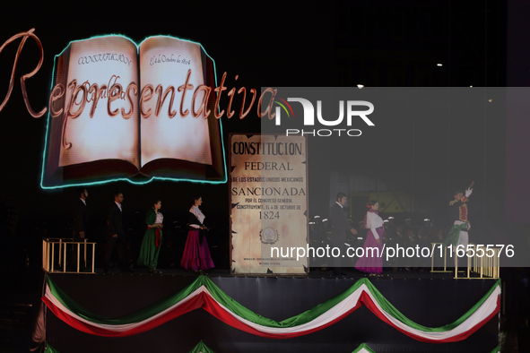 A performance and commemorative ceremony of the 200th anniversary of the Mexican Republic takes place in the Zocalo of Mexico City, Mexico,...