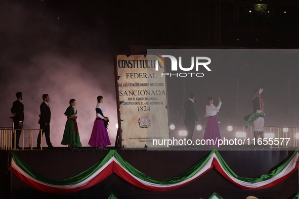 A performance and commemorative ceremony of the 200th anniversary of the Mexican Republic takes place in the Zocalo of Mexico City, Mexico,...