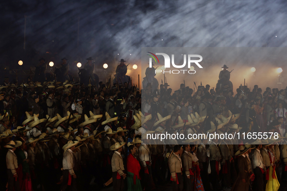 A performance and commemorative ceremony of the 200th anniversary of the Mexican Republic takes place in the Zocalo of Mexico City, Mexico,...