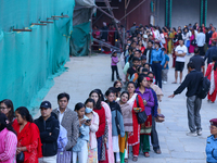 Nepali Hindu devotees stand in a queue to reach the Taleju Bhawani Temple in Kathmandu Durbar Square, Nepal, on October 11, 2024, on the fin...