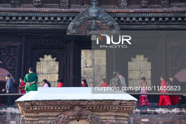 Nepali Hindu devotees worship around the Taleju Bhawani Temple in Kathmandu Durbar Square, Kathmandu, Nepal, on October 11, 2024, on the fin...