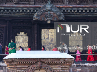 Nepali Hindu devotees worship around the Taleju Bhawani Temple in Kathmandu Durbar Square, Kathmandu, Nepal, on October 11, 2024, on the fin...