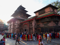 Nepali Hindu devotees stand in a queue to reach the Taleju Bhawani Temple in Kathmandu Durbar Square, Nepal, on October 11, 2024, on the fin...