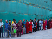 Nepali Hindu devotees stand in a queue to reach the Taleju Bhawani Temple in Kathmandu Durbar Square, Nepal, on October 11, 2024, on the fin...