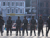 Nepal Army personnel stand guard in the courtyard of Kathmandu Durbar Square as the procession for the day of Nawaratri, also called Maha Na...