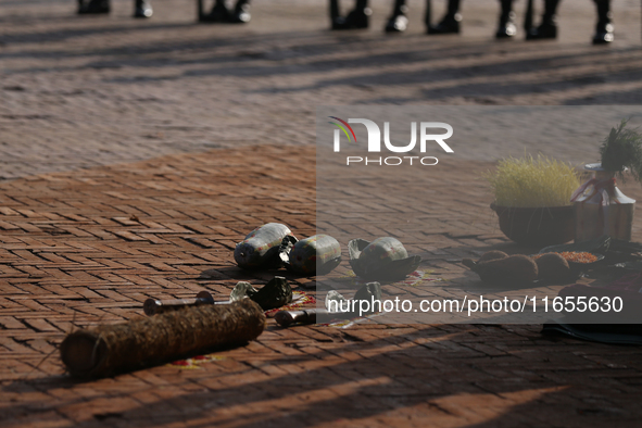 Weapons prepared for the sacrifice of a he-goat and a he-buffalo are worshipped ahead of the sacrifice ceremony on the ninth and final day o...