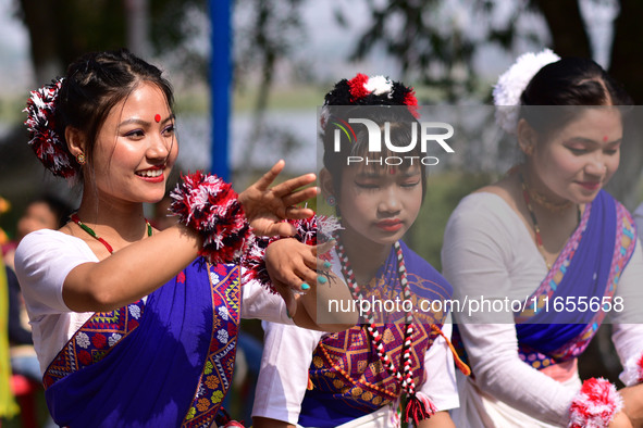 Mising tribal girls perform a traditional dance during the Ali-Aye-Ligang festival in Nagaon district, Assam, India, on February 15, 2023. A...