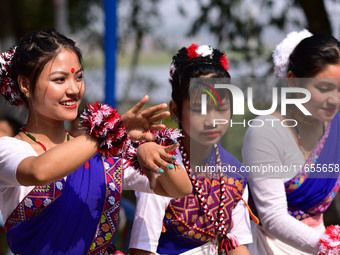 Mising tribal girls perform a traditional dance during the Ali-Aye-Ligang festival in Nagaon district, Assam, India, on February 15, 2023. A...