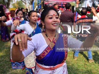 Mising tribal girls perform a traditional dance during the Ali-Aye-Ligang festival in Nagaon district, Assam, India, on February 15, 2023. A...