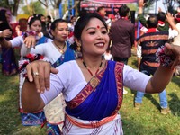 Mising tribal girls perform a traditional dance during the Ali-Aye-Ligang festival in Nagaon district, Assam, India, on February 15, 2023. A...