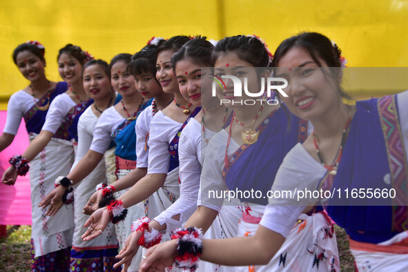 Mising tribal girls perform a traditional dance during the Ali-Aye-Ligang festival in Nagaon district, Assam, India, on February 15, 2023. A...