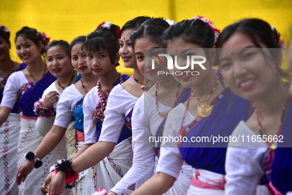 Mising tribal girls perform a traditional dance during the Ali-Aye-Ligang festival in Nagaon district, Assam, India, on February 15, 2023. A...