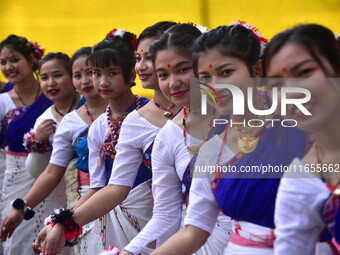 Mising tribal girls perform a traditional dance during the Ali-Aye-Ligang festival in Nagaon district, Assam, India, on February 15, 2023. A...