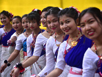 Mising tribal girls perform a traditional dance during the Ali-Aye-Ligang festival in Nagaon district, Assam, India, on February 15, 2023. A...