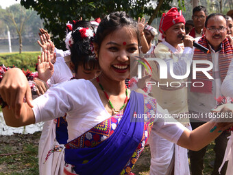 Mising tribal girls perform a traditional dance during the Ali-Aye-Ligang festival in Nagaon district, Assam, India, on February 15, 2023. A...