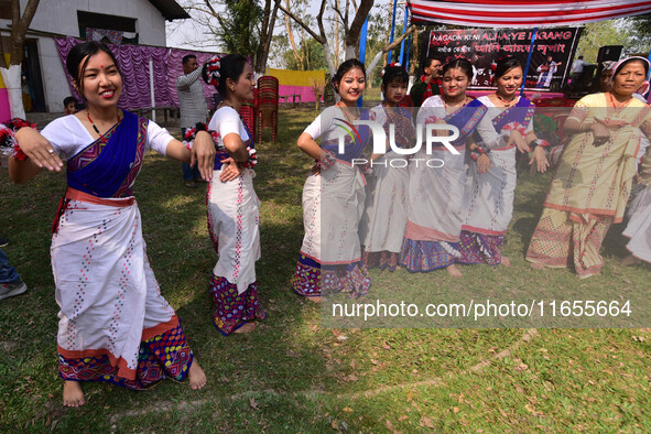 Mising tribal girls perform a traditional dance during the Ali-Aye-Ligang festival in Nagaon district, Assam, India, on February 15, 2023. A...