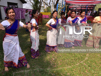 Mising tribal girls perform a traditional dance during the Ali-Aye-Ligang festival in Nagaon district, Assam, India, on February 15, 2023. A...