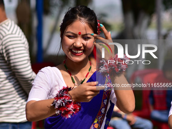 Mising tribal girls perform a traditional dance during the Ali-Aye-Ligang festival in Nagaon district, Assam, India, on February 15, 2023. A...