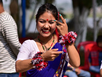 Mising tribal girls perform a traditional dance during the Ali-Aye-Ligang festival in Nagaon district, Assam, India, on February 15, 2023. A...