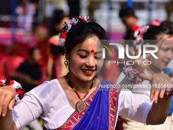 Mising tribal girls perform a traditional dance during the Ali-Aye-Ligang festival in Nagaon district, Assam, India, on February 15, 2023. A...