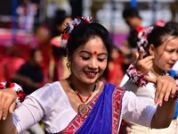 Mising tribal girls perform a traditional dance during the Ali-Aye-Ligang festival in Nagaon district, Assam, India, on February 15, 2023. A...