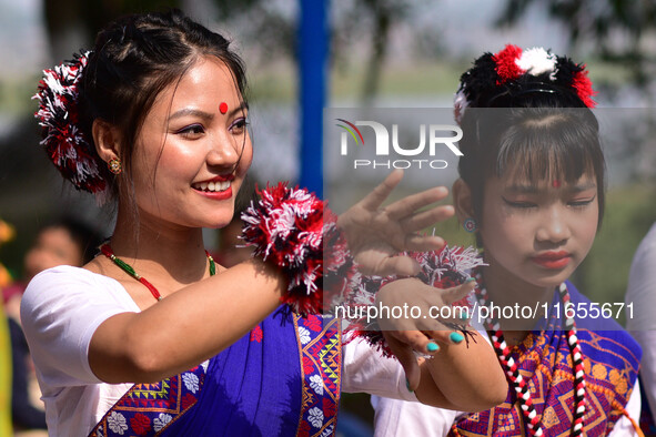 Mising tribal girls perform a traditional dance during the Ali-Aye-Ligang festival in Nagaon district, Assam, India, on February 15, 2023. A...