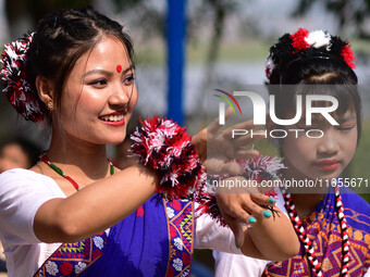 Mising tribal girls perform a traditional dance during the Ali-Aye-Ligang festival in Nagaon district, Assam, India, on February 15, 2023. A...