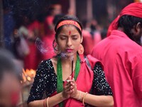 Devotees offer prayer at the Kamakhya temple for the Hindu festival of Navratri in Guwahati, India, on October 2, 2022. (