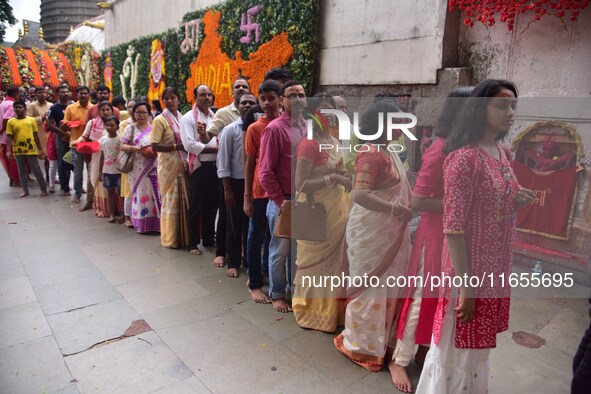 Devotees gather at the Kamakhya temple for the Hindu festival of Navratri in Guwahati, India, on October 2, 2022. 