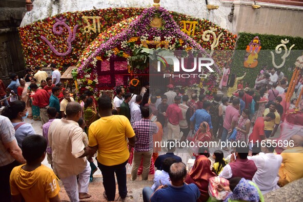 Devotees gather at the Kamakhya temple for the Hindu festival of Navratri in Guwahati, India, on October 2, 2022. 